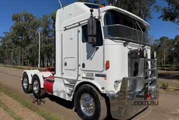 2003 Kenworth K104, Cummins Signature 520, 18sp, 90T rated