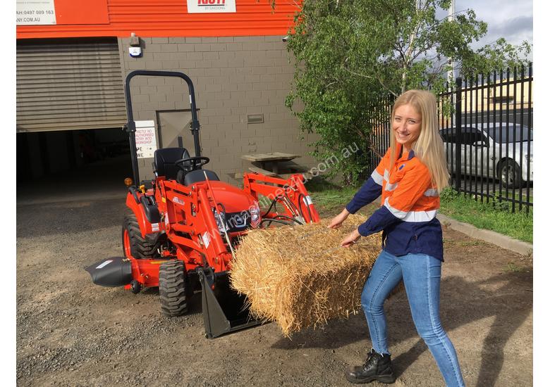 caption Kioti CS 2610 Compact Tractor with Loader & 4in1 Bucket.