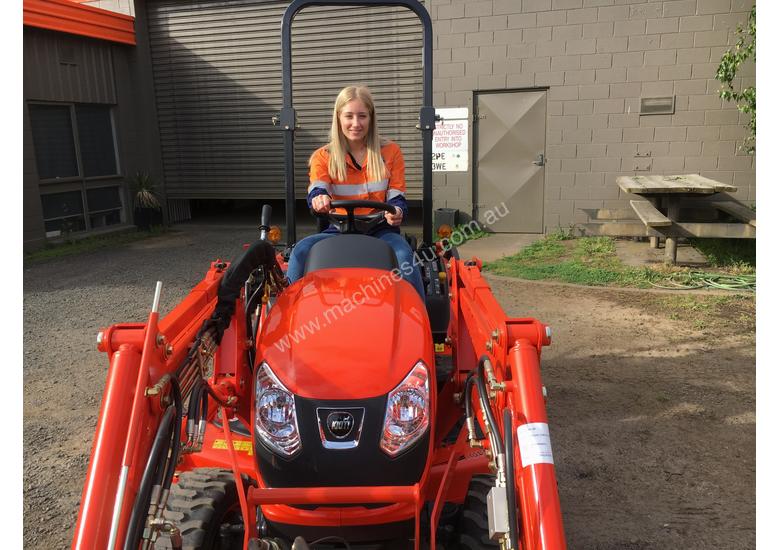 caption Kioti CS 2610 Compact Tractor with Loader & 4in1 Bucket.