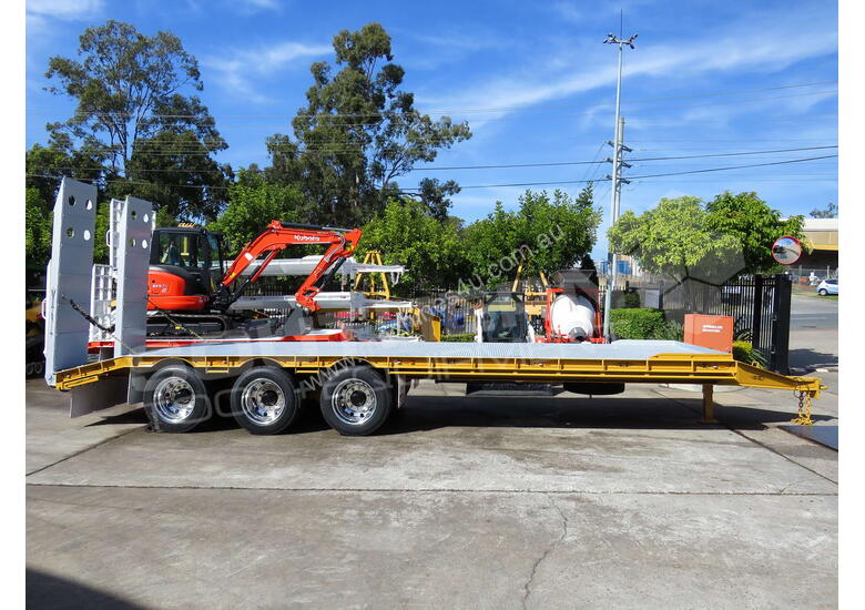 caption Interstate trailers Tri Axle Tag Trailer 28 Ton ATM Custom Yellow ATTTAG
