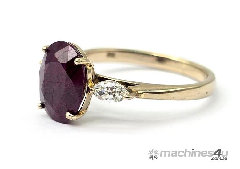 caption 18 CARAT WHITE GOLD DIAMOND AND RUBY RING