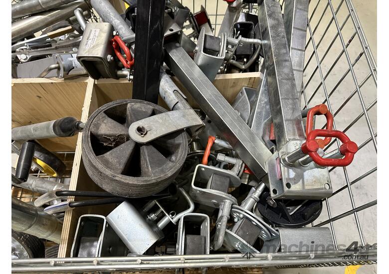 caption Cage Of Assorted Jockey Wheels And Stands