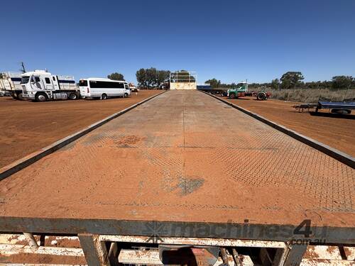 caption 1985 Fruehauf 45ft Flat Deck Tri-Axle