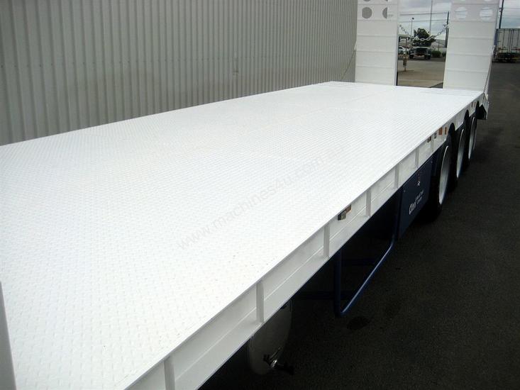 caption HEAVY DUTY TAG TRAILERS