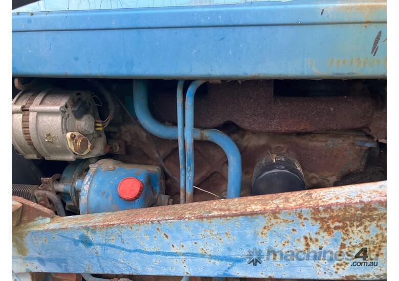 caption 1985 Ford 318430 Tractor / Loader