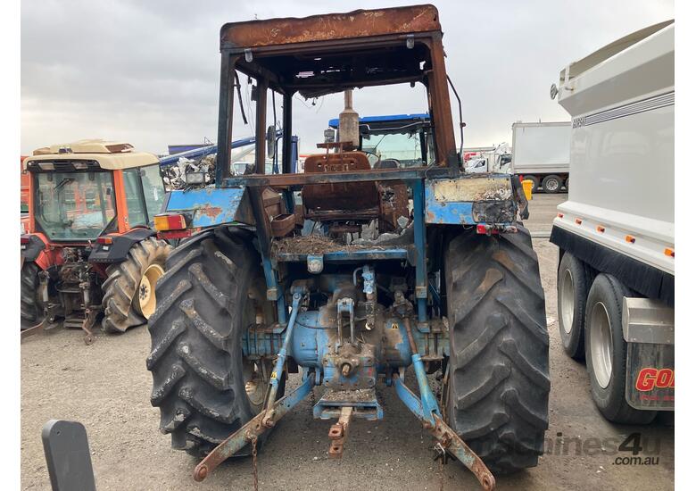 caption 1985 Ford 318430 Tractor / Loader