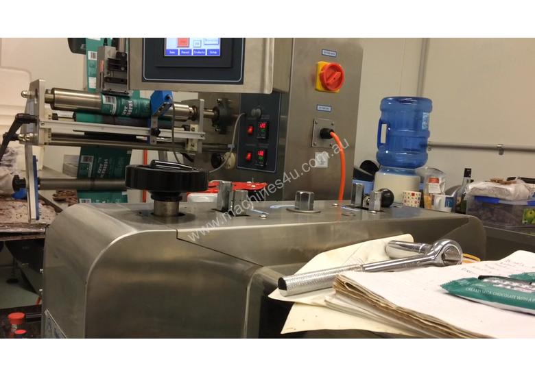 caption Flamingo Stainless Steel Horizontal Flow Wrapper Packing Machine + Anser U2 Pro-S label/date printer