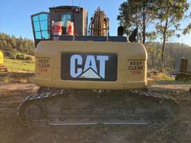 Used 2015 Caterpillar 320DFM Harvester with Waratah 618C - picture1' - Click to enlarge