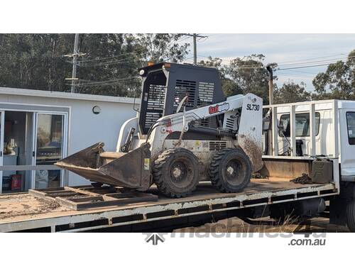 2023 Skid Steer with Spreader Bar