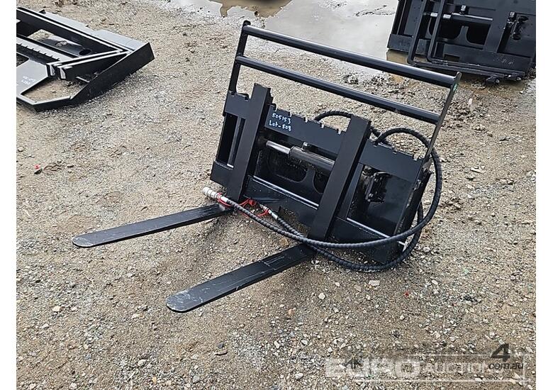 caption Unused Captok Side Shift Forks to suit Mini Skidsteer Loader
