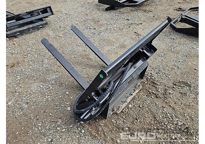 caption Unused Captok Side Shift Forks to suit Mini Skidsteer Loader