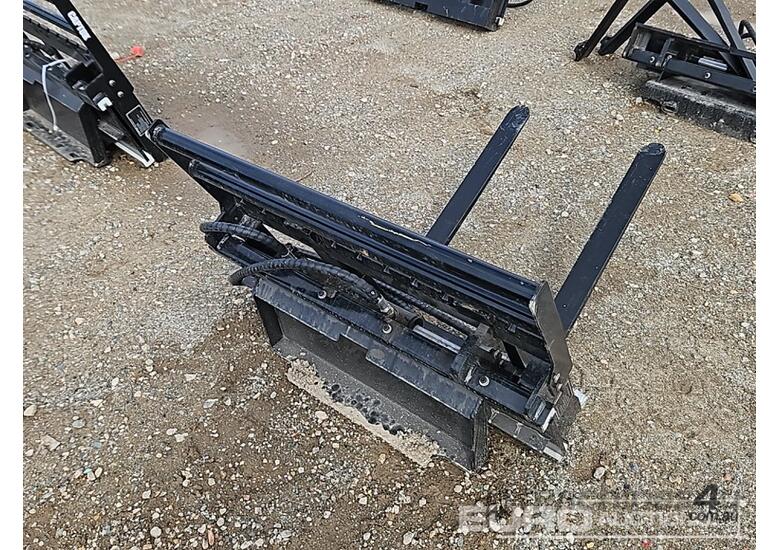 caption Unused Captok Side Shift Forks to suit Mini Skidsteer Loader