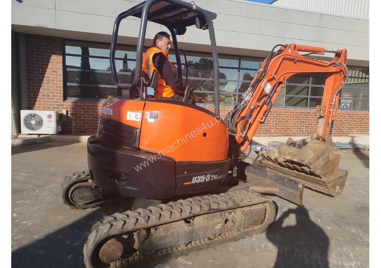 caption USED 2013 KUBOTA U35-3 EXCAVATOR WITH QUICK HITCH AND 4 BUCKETS