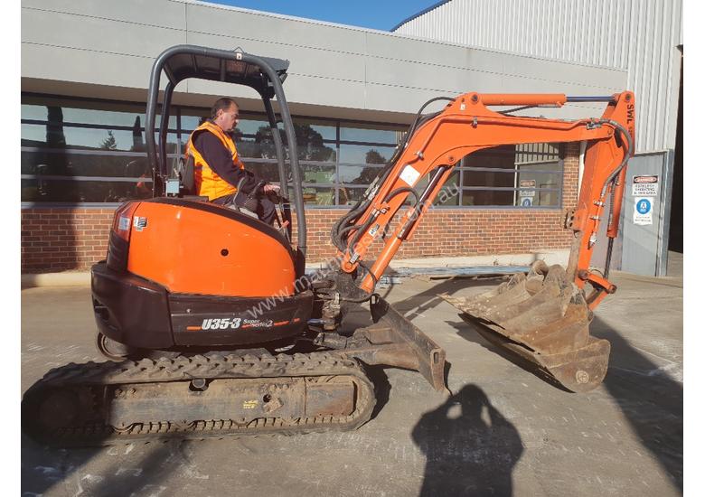 caption USED 2013 KUBOTA U35-3 EXCAVATOR WITH QUICK HITCH AND 4 BUCKETS