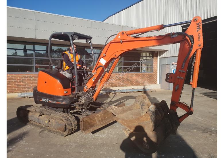 caption USED 2013 KUBOTA U35-3 EXCAVATOR WITH QUICK HITCH AND 4 BUCKETS