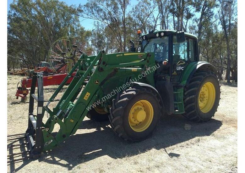 caption John Deere 6140m With FEL