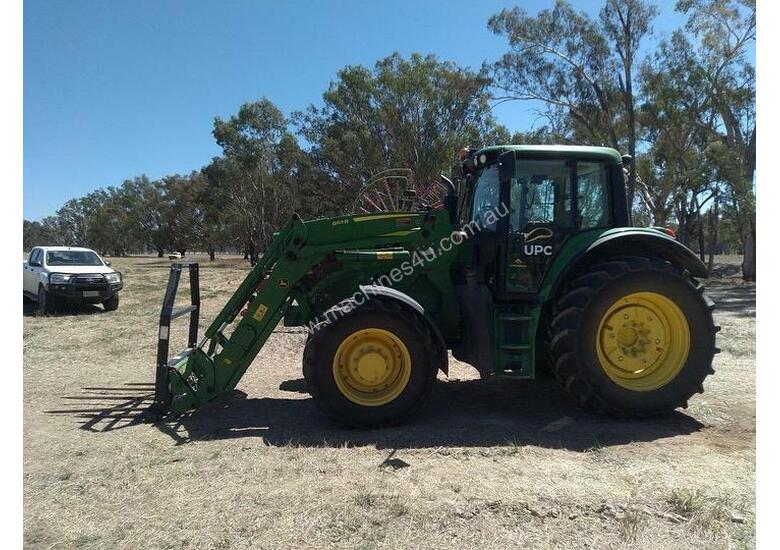 caption John Deere 6140m With FEL