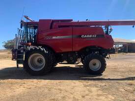Case IH 7120 on duals with 35 foot Case front on trailer and 16 foot Case 3016 pickup - picture0' - Click to enlarge