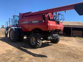 Case IH 7120 on duals with 35 foot Case front on trailer and 16 foot Case 3016 pickup - picture1' - Click to enlarge