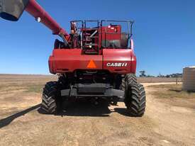Case IH 7120 on duals with 35 foot Case front on trailer and 16 foot Case 3016 pickup - picture2' - Click to enlarge