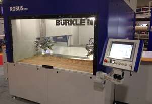 Automated base and top coating machine. Spray booth