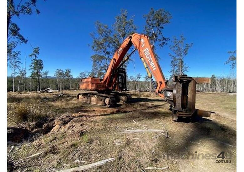 caption 2002 DAEWOO 290LC-V BUNCHER WITH PULPMATE HEAD