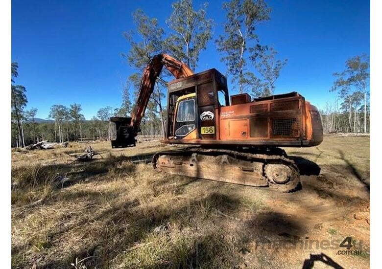 caption 2002 DAEWOO 290LC-V BUNCHER WITH PULPMATE HEAD