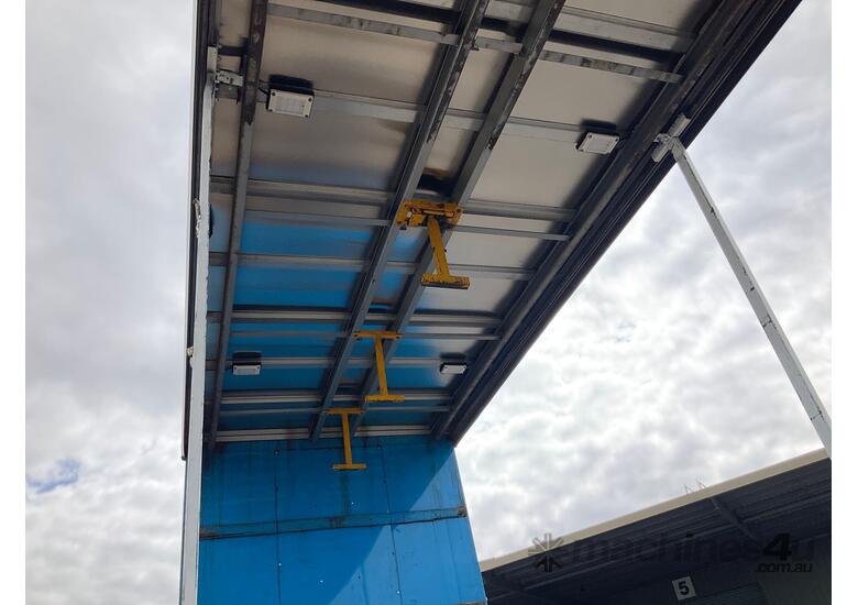 caption 2009 Maxitrans ST3 Tri Axle Drop Deck Curtainside B Trailer