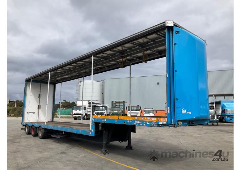 caption 2009 Maxitrans ST3 Tri Axle Drop Deck Curtainside B Trailer