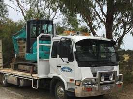 Used 2004 Nissan UD and 2015 3.5 tonne Kobelco for Sale - Low hours and kms Excellent condition - picture2' - Click to enlarge