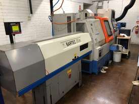 Mazak CNC lathe with sub-spindle and bar feeder - picture0' - Click to enlarge