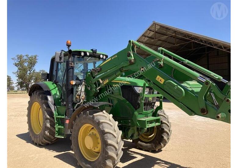 caption John Deere 6140m With FEL
