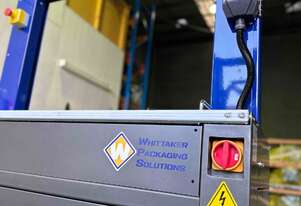 WHITTAKER PACKAGING - High Speed Automatic Strapping Machine
