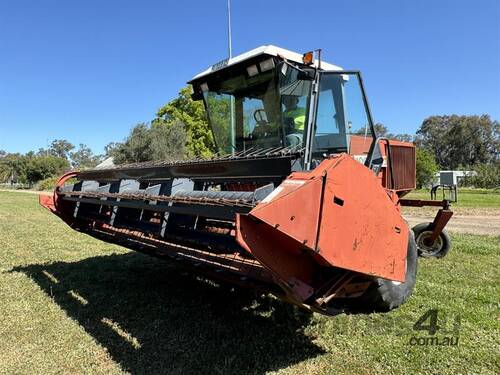 HESSTON 8100 WINDROWER + MOWER CONDITIONER