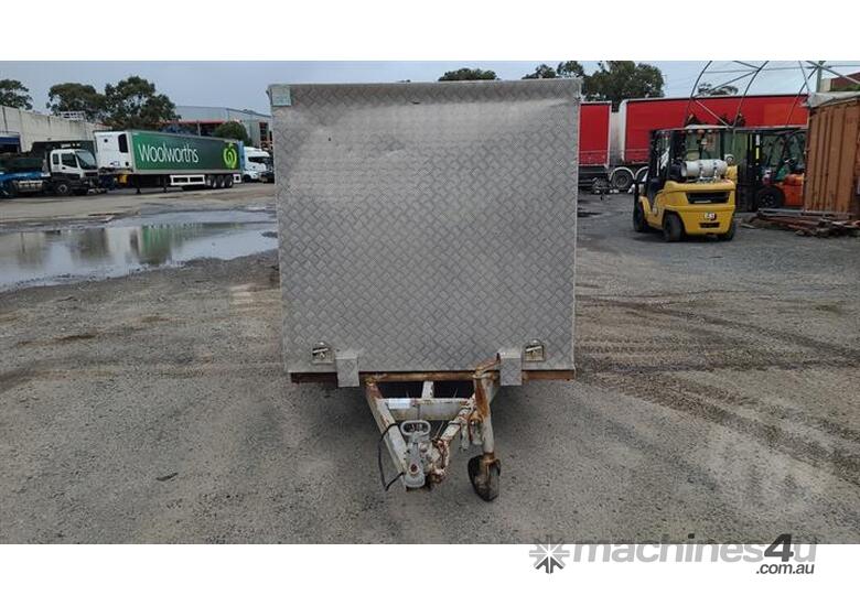 caption AUX Trailers Manufacturing 12X5