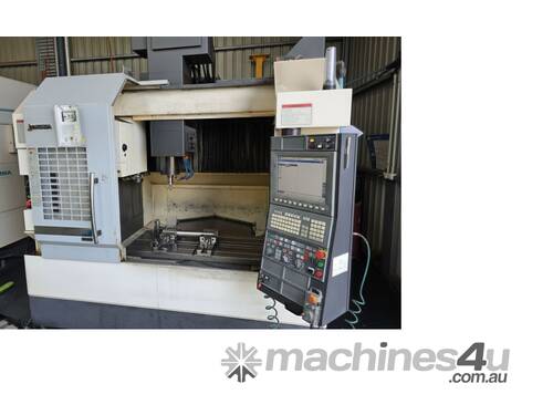 2015 OKUMA GENOS M560R-V MACHINING CENTRE WITH TRX320 ROTARY TABLE