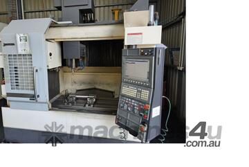 2015 OKUMA GENOS M560R-V MACHINING CENTRE WITH TRX320 ROTARY TABLE