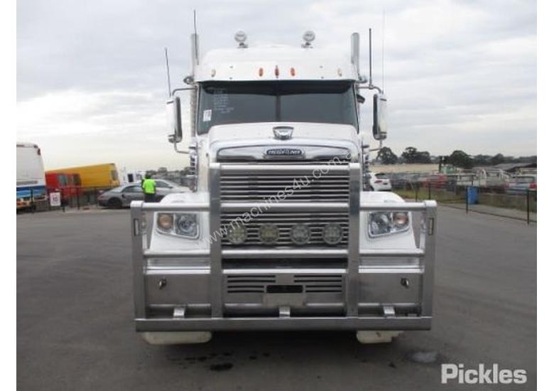 caption 2013 Freightliner Coronado 114