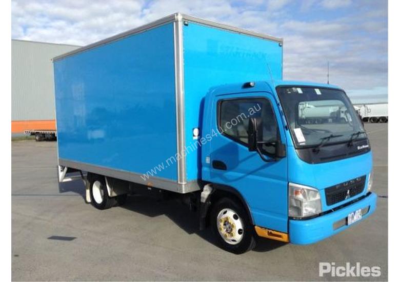caption 2010 Mitsubishi Canter FE84