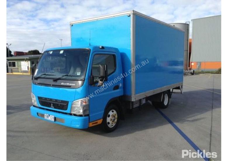 caption 2010 Mitsubishi Canter FE84