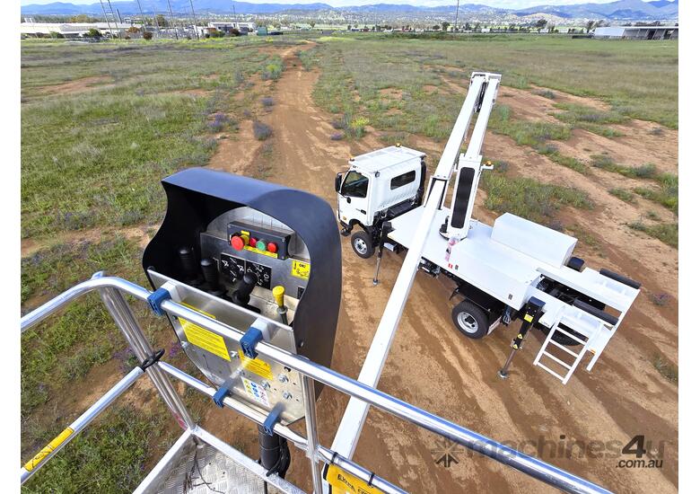 caption Truck Mounted Lift: Waimea E209PX - Versatile Package for Heavy Duty Applications!