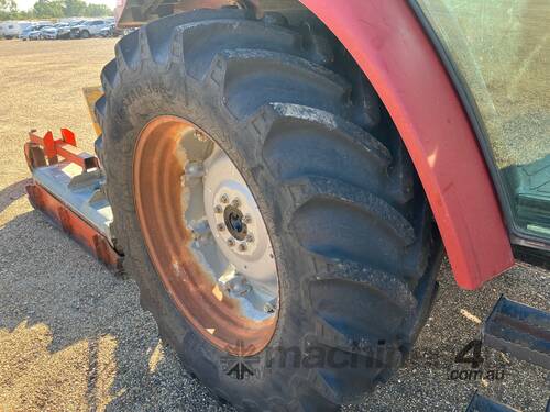 caption 2012 Case JXU95 4WD Tractor