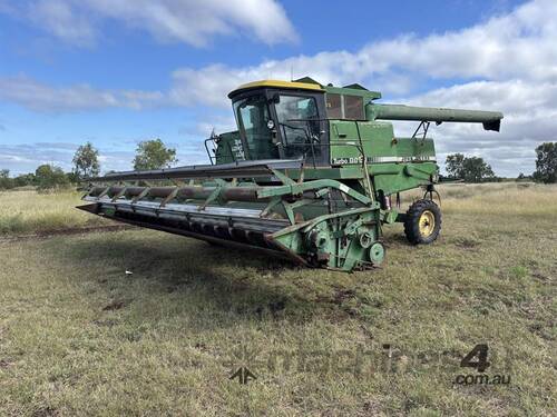 caption JOHN DEERE 8820 COMBINE HARVESTER
