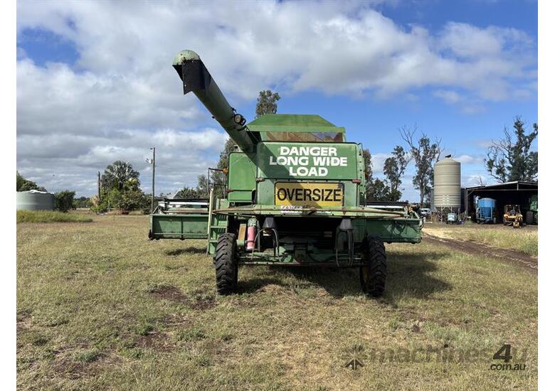 caption JOHN DEERE 8820 COMBINE HARVESTER