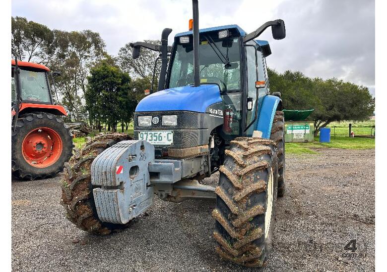 caption NEW HOLLAND TS90 4WD TRACTOR.