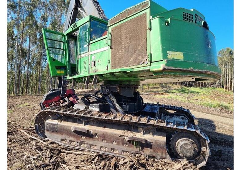caption 2011 JOHN DEERE 909KH TILT-BASE HARVESTER WITH WARATAH 624C HEAD