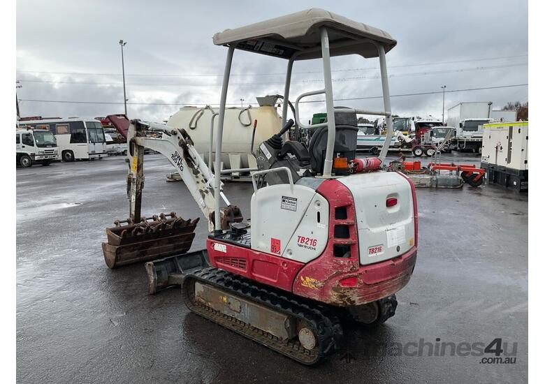caption Takeuchi TB216 Mini Excavator (Rubber Track)
