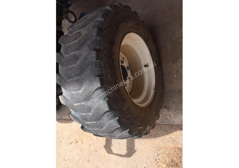 caption New Holland Boomer 4055 FWA/4WD Tractor