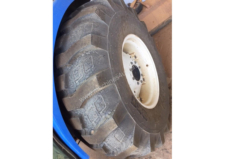 caption New Holland Boomer 4055 FWA/4WD Tractor