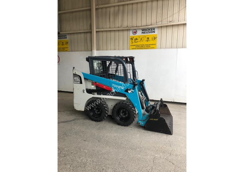 caption TOYOTA HUSKI SKID STEER & TRAILER